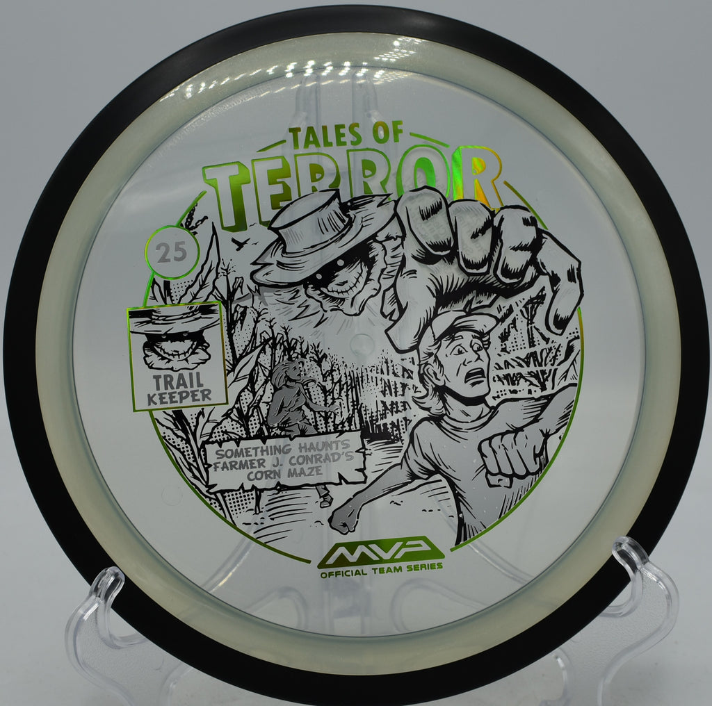 Halloween Trail disc in Proton plastic holding flat laser beam on hole 6 at Rivery Park DGC, Georgetown TX.