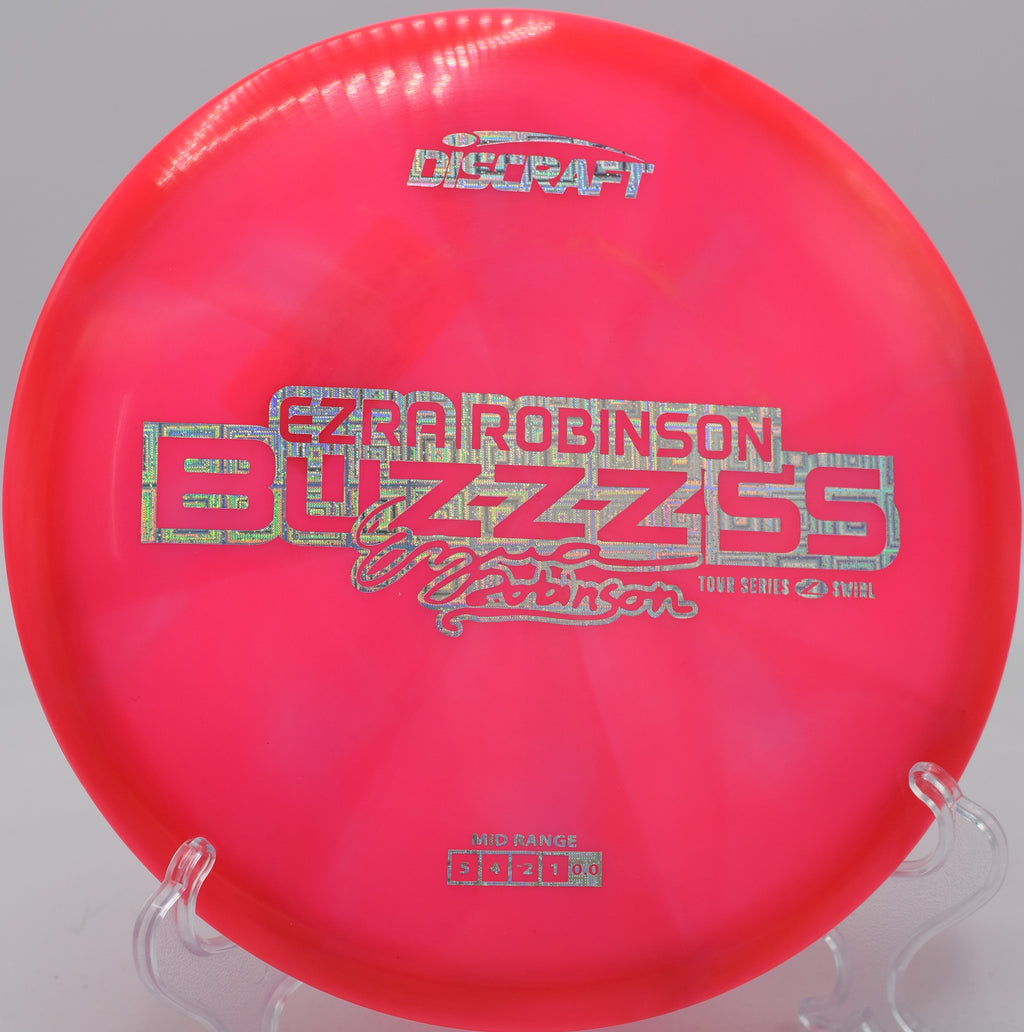 Player shaping a turnover line with Z Swirl Buzzz SS at Maple Hill Disc Golf Course in Leicester, Massachusetts.

