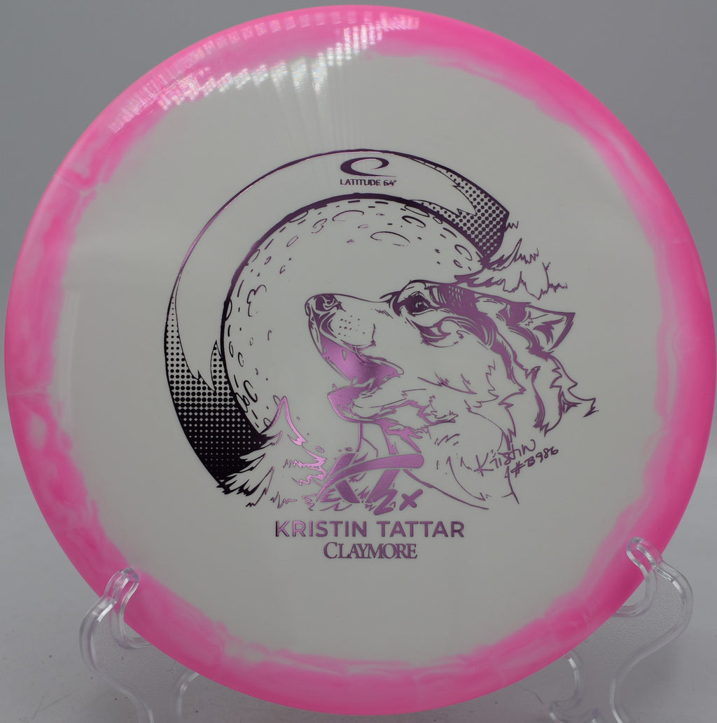 2024 Kristin Tattar Gold Orbit Claymore Latitude 64° disc carving wooded lines at Hornets Nest Disc Golf Course in Charlotte, North Carolina.