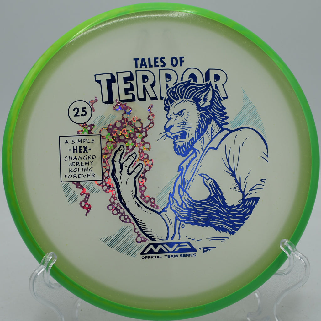 Jeremy Koling glow Eclipse Hex Halloween edition settling softly at Selah Ranch Disc Golf Course in Talco, Texas.