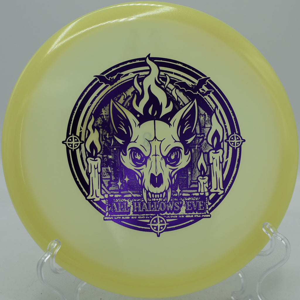 Innova Proto Glow Champion Fox disc thrown under the lights at Glenwood Springs Disc Golf Course in Glenwood Springs, Colorado
