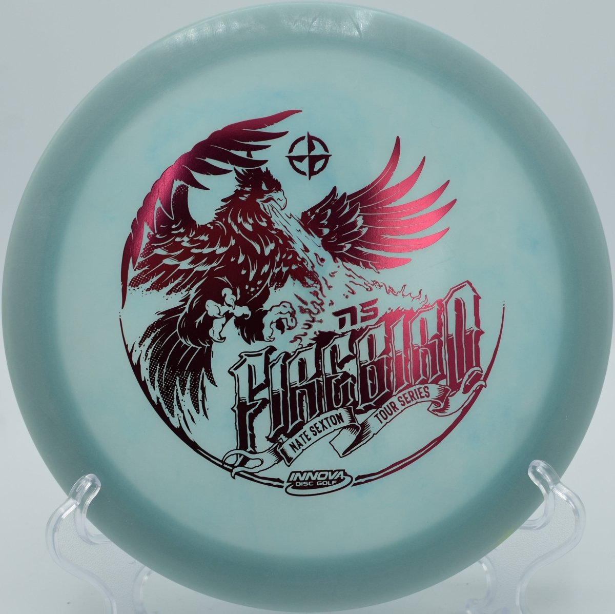 Glow Halo Champion Firebird disc golf fairway driver fighting headwinds with a spike hyzer at Cedarock Park Disc Golf Course, Burlington, North Carolina