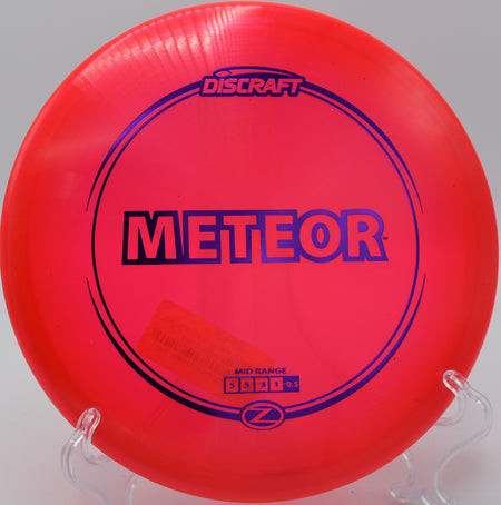 Discraft Meteor Z – Neutral-stable disc with understable glide at Sabattus Disc Golf Complex in Maine.

