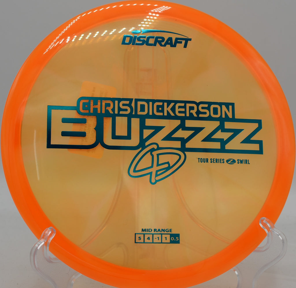 Discraft Buzzzsaw thrown standstill and flat, floating straight at Water Works Park in Kansas City.

