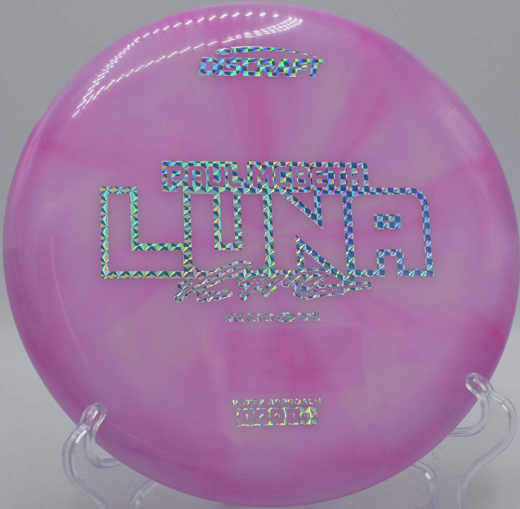 Luna in premium Z Swirl plastic caught mid-turn at Fox Run Meadows in Jeffersonville, Vermont, designed for approach shots with finesse.

