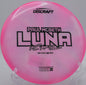 Discraft Z Swirl Luna resting beside chains at Winthrop Gold in Rock Hill, South Carolina, used by pros for reliable putting and accurate approaches.

