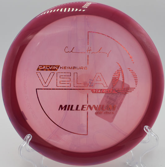 "Vela disc carving a gentle turnover line through the air in Atlanta, Georgia, ideal for technical approach throws."
