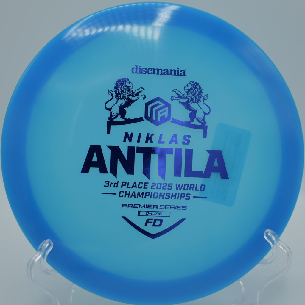 Discmania Q-Line FD gliding under canopy cover at Tyler State Park Disc Golf Course in Newtown, Pennsylvania.