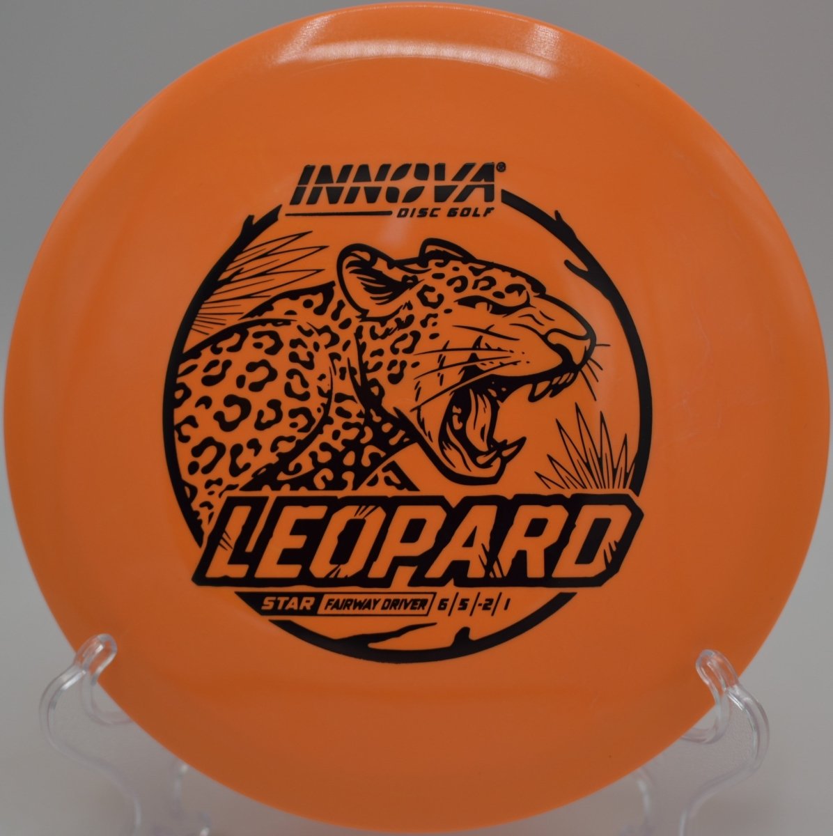 Innova Star Leopard driver parked under basket after a controlled turnover approach at Rocky Hills Disc Golf Course in Oxford, Connecticut