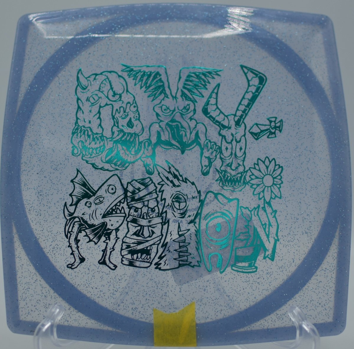 Oxymoron Clandestine Doomsday Discs thrown by players in Texas for nontraditional disc golf shots