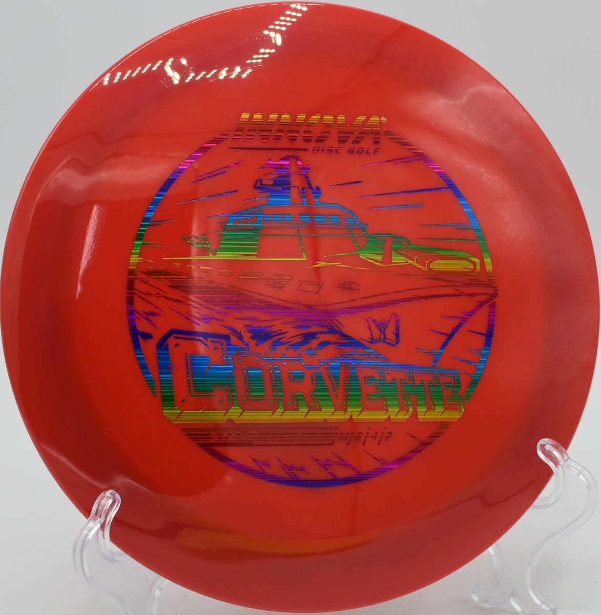 Innova Star Corvette driver carving a long S-curve through wide fairway at Harmon Hills Disc Golf Course in Fall Branch, Tennessee