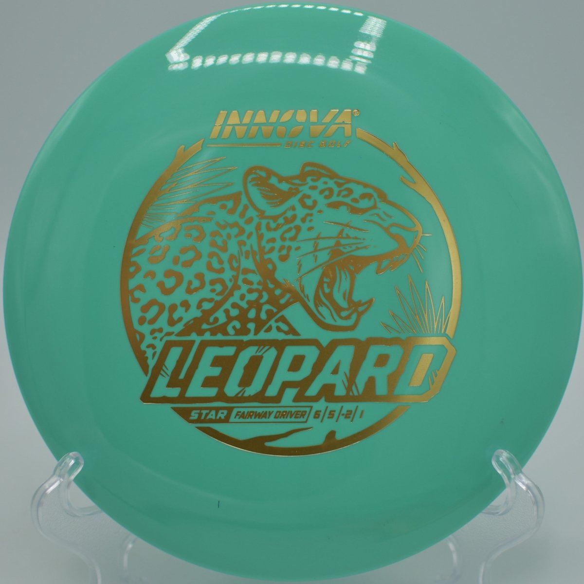 Innova Star Leopard driver staged on tee pad for a precision fairway shot at Hobbs Farm Disc Golf Course in Carrollton, Georgia