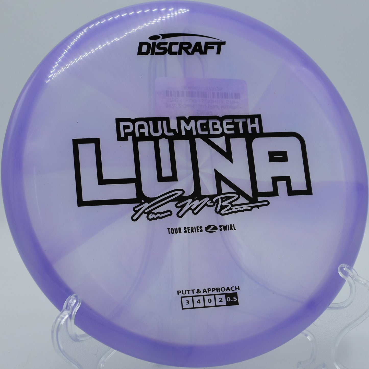 Z Swirl Luna fading cleanly beside a water hazard at Brickyard Disc Golf Course in Menifee, California, ideal for stress-free putts and short-range drives.

