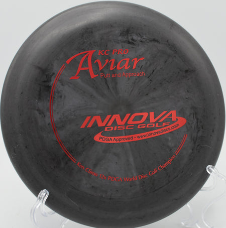 Firm KC Aviar fading gently after a confident tee putt at North Cove DGC in Marion, North Carolina.


