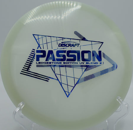 UV Z Passion mid-flight on a straight fairway drive at Maple Hill Disc Golf Course in Massachusetts, showing off its consistent glide and turn