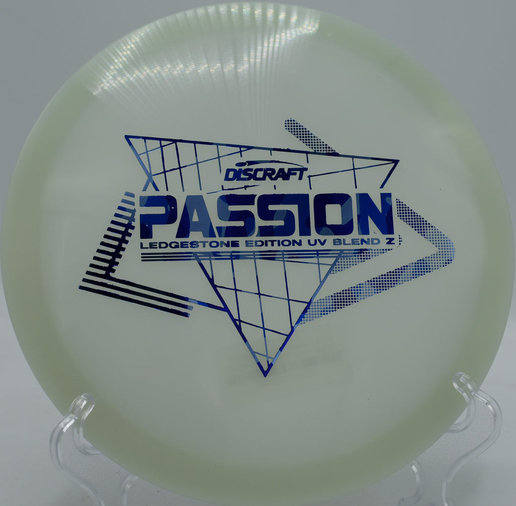 Throwing the Paige Pierce UV Z Passion on a controlled turnover line at Tyler State Park Disc Golf Course, delivering pinpoint placement through narrow gaps