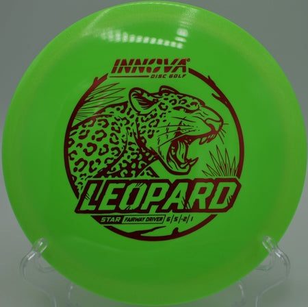 Innova Star Leopard driver parked near basket after a soft hyzer finish at Riverview Park Disc Golf Course in Mesa, Arizona