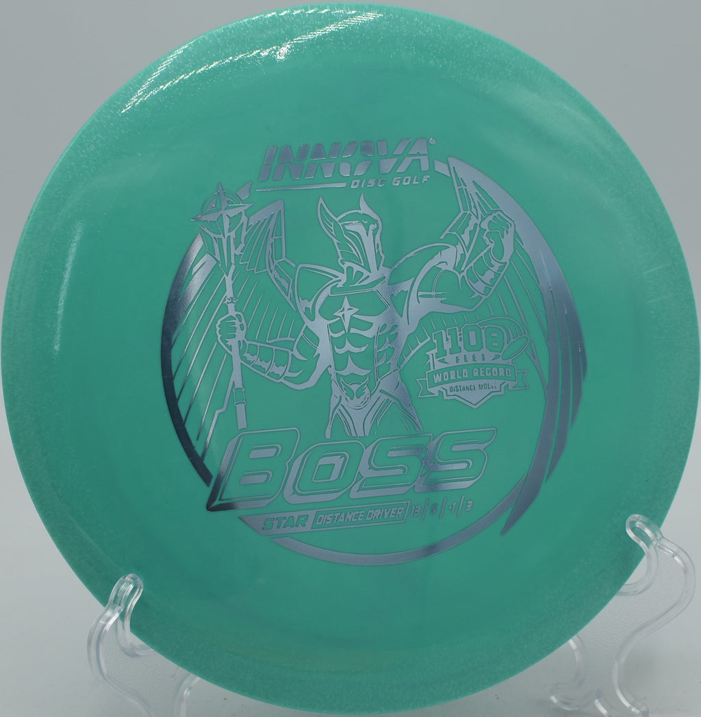 Star Boss max-distance driver shaping an S-curve at Northwood Black Disc Golf Course in Morton, Illinois