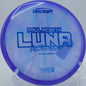 Paul McBeth Z Swirl Luna resting on lush fairway grass at Bryant Lake Park in Eden Prairie, Minnesota, favored for approach precision.

