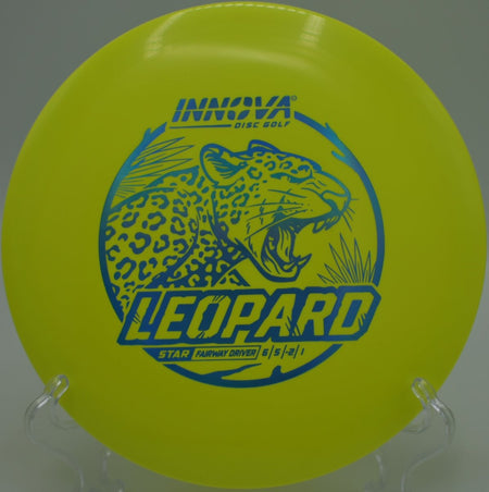 Star Leopard fairway driver flying a flat release line with gentle turn at Searight Park Disc Golf Course in Austin, Texas