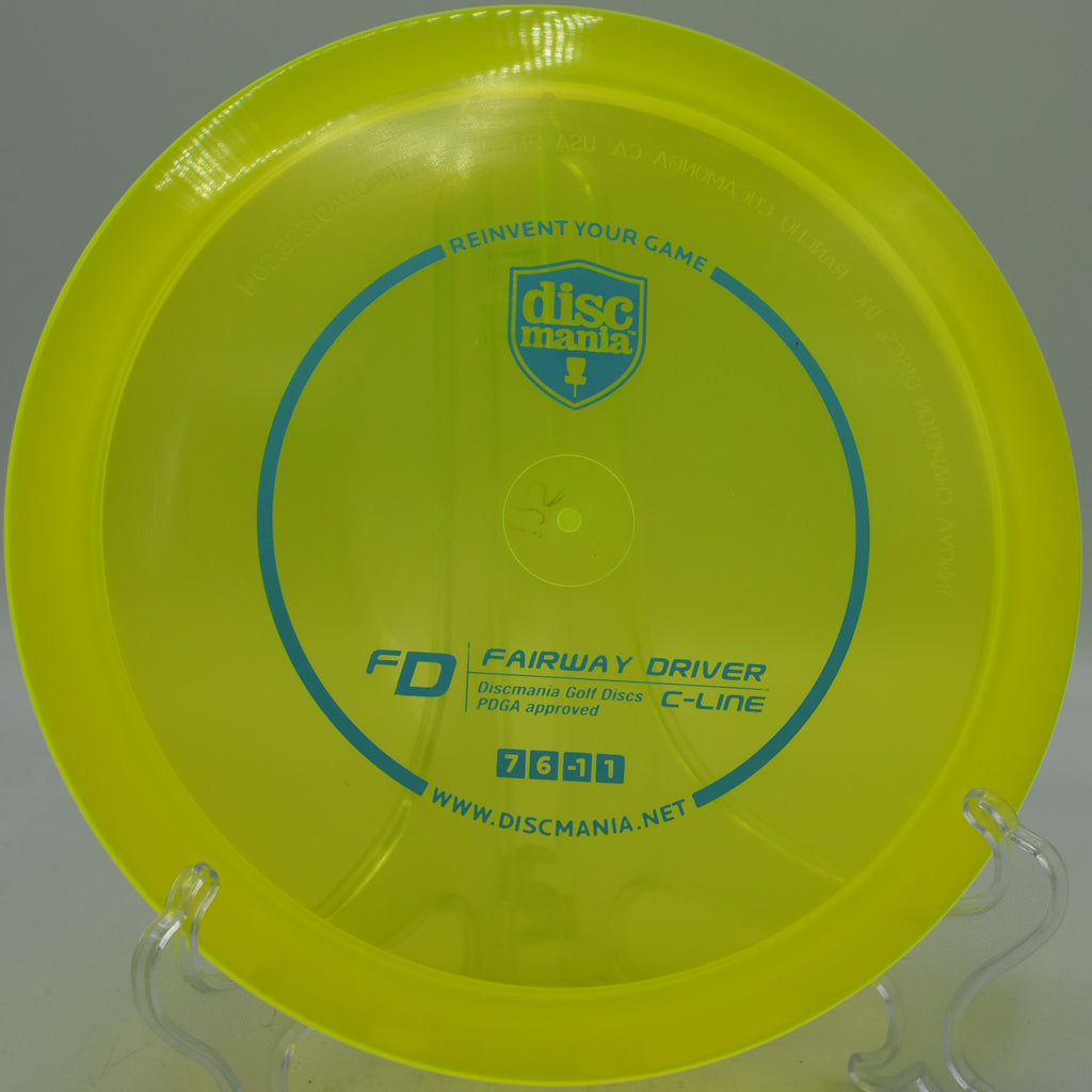 Discmania C-Line FD embossed Innova Made used fairway driver gliding straight down the fairway at DeLaveaga Disc Golf Course in Santa Cruz, California.