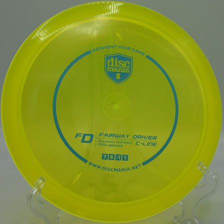 Discmania C-Line FD embossed Innova Made used fairway driver gliding straight down the fairway at DeLaveaga Disc Golf Course in Santa Cruz, California.