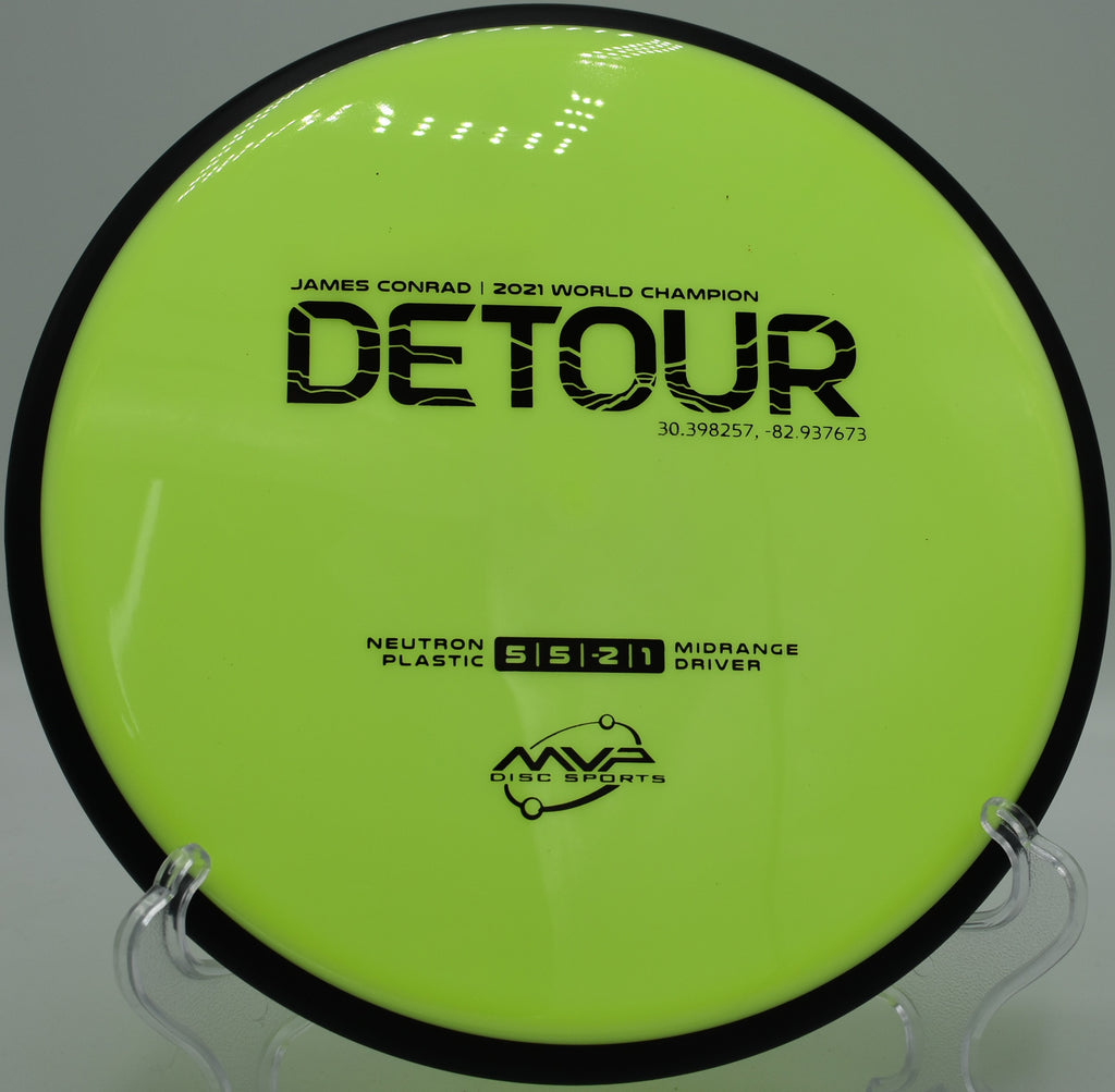 MVP Neutron Detour midrange gliding through a tight tunnel shot at Hornets Nest Disc Golf Course in Charlotte, North Carolina, showcasing its controllable understability and smooth Neutron grip.

