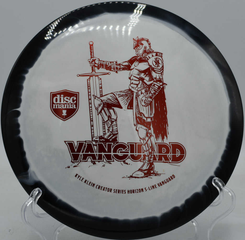 S-Line Horizon Vanguard launched downhill on a flex line with full commitment at Sabattus Disc Golf Complex in Maine.


