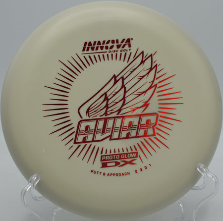 Glow DX Aviar putter glowing under UV light at Morley Field Disc Golf Course in San Diego, California