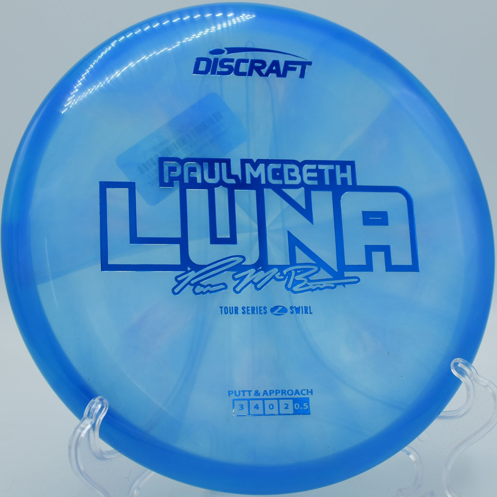 Premium Z Swirl Luna flying flat across desert terrain at Thunderbird DGC in Show Low, Arizona, offering fade control in dry, windy conditions.

