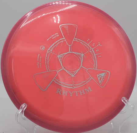 Controlled turnover drive with Neutron Rhythm shaping a left-to-right arc through the redwoods at DeLaveaga Disc Golf Course in Santa Cruz, CA

