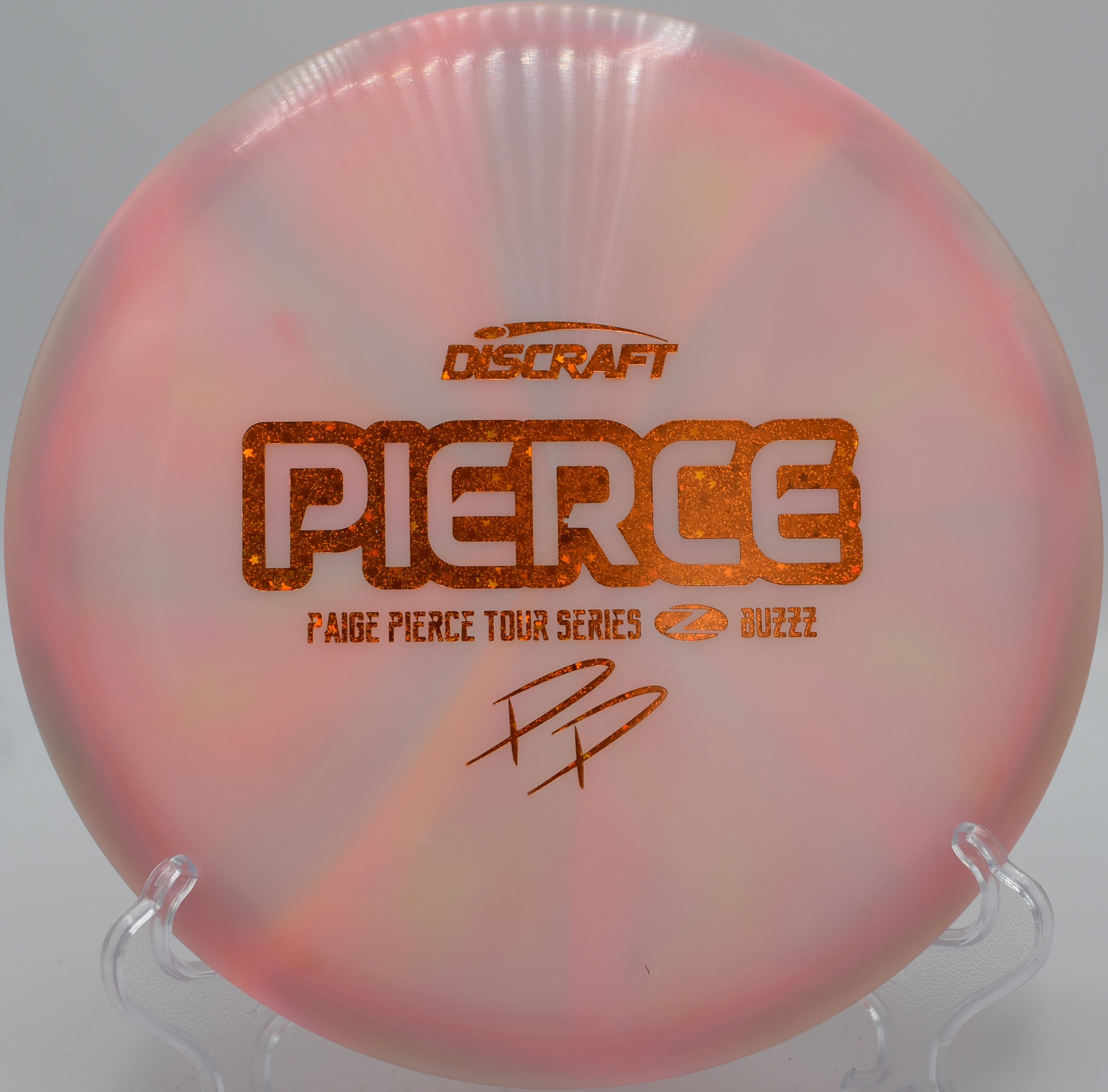 Z Swirl Buzzz disc golf midrange executing a controlled turnover at Trophy Lakes Disc Golf Course, Johns Island, South Carolina