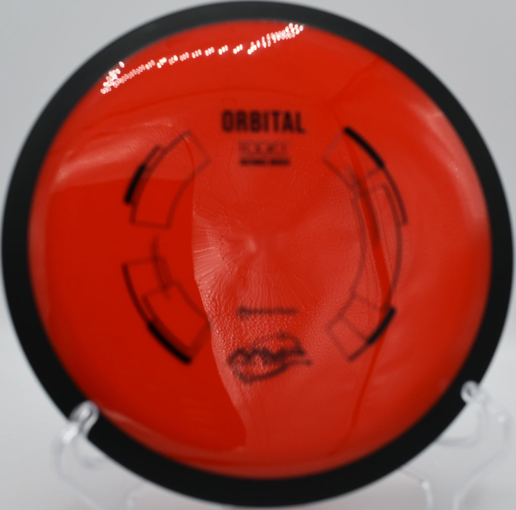 MVP Neutron Orbital captured mid-turn on a wide anhyzer line at Golden Gate Park Disc Golf Course in San Francisco, California, emphasizing its understable flight and high-speed glide for max-distance shaping.