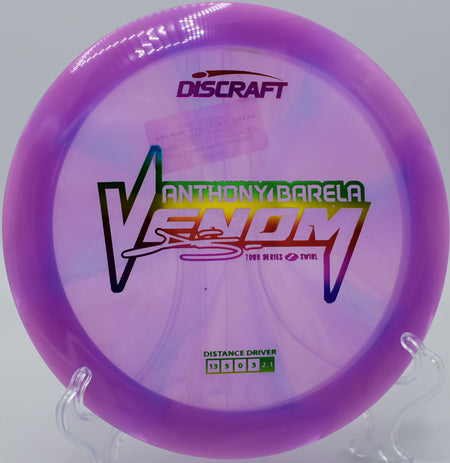 Disc golfer throwing a full flex with Z Swirl Venom at Smugglers’ Notch Fox Run Meadows in Vermont.

