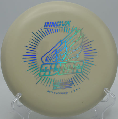 Glow DX Aviar disc glowing during a putt at Northwood Black in Morton, Illinois