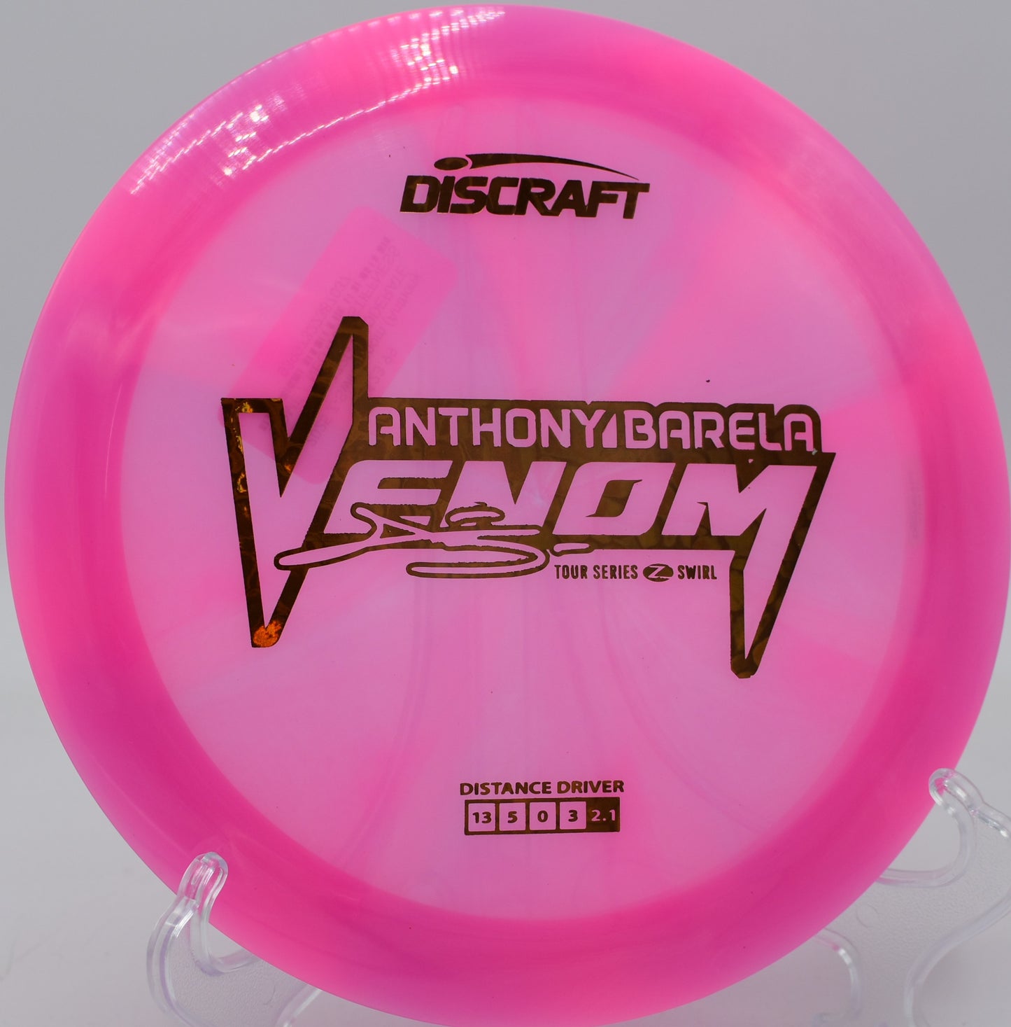 Close-up of shimmering swirl pattern on Venom at Tyler State Park Disc Golf Course in Pennsylvania.

