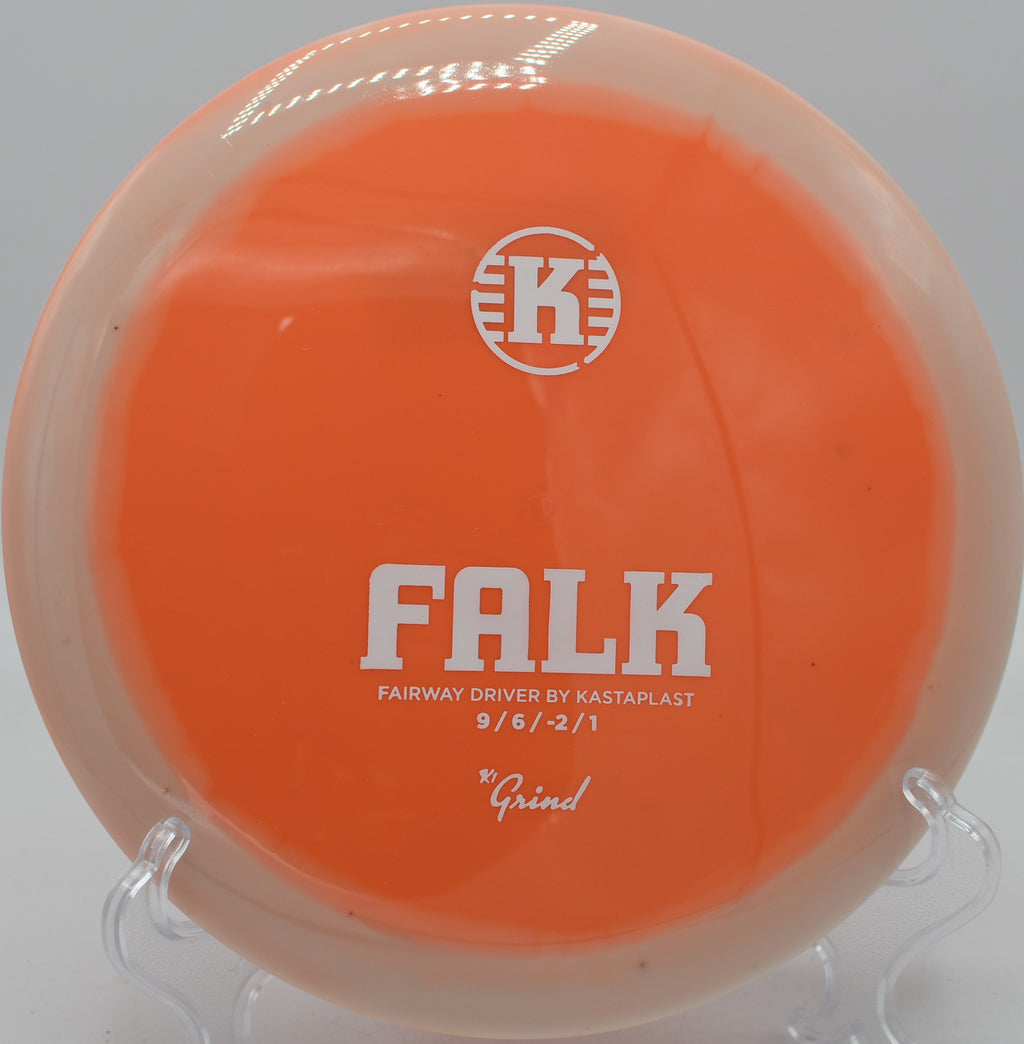 K1 Grind Falk turning gracefully on a long anhyzer at Maple Hill Disc Golf Course in Leicester, Massachusetts.

