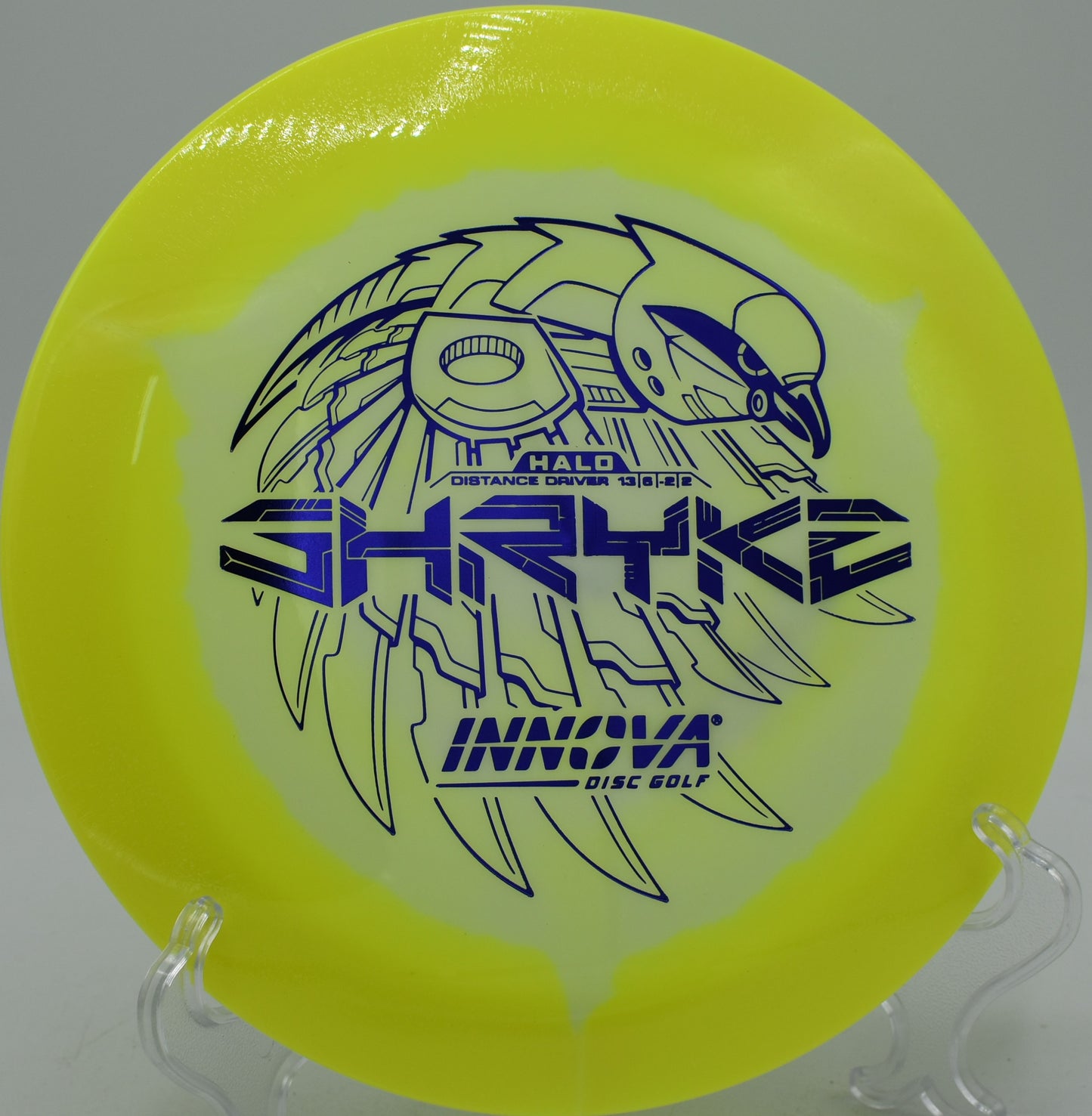 Innova Halo Star Shryke disc soaring on a wide turnover line at Winthrop Gold Disc Golf Course in Rock Hill, South Carolina