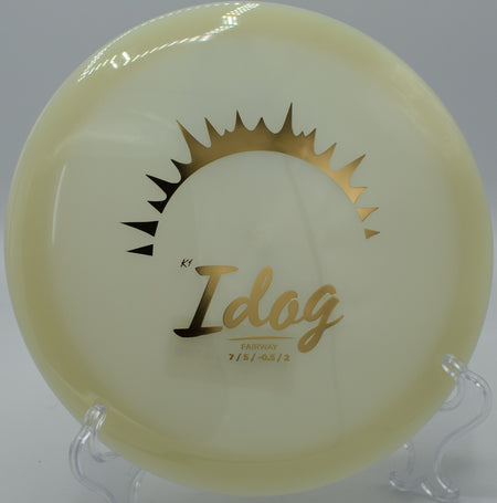 Glow K1 Idog soaring on a controlled fairway shot at Eagle Scout Disc Golf Course in Riverton, Wyoming, glowing bright through the dusk.







