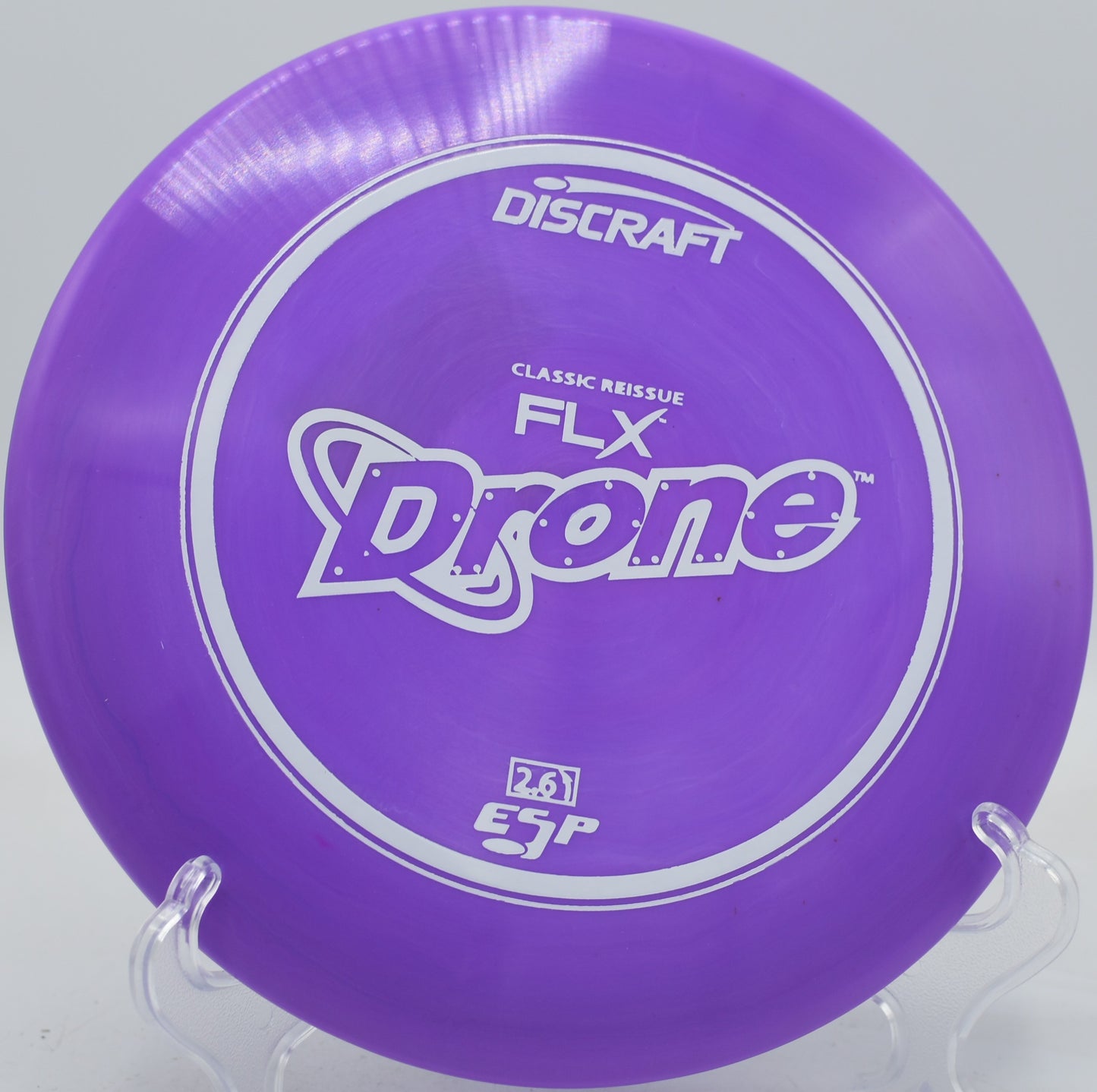 Discraft Drone in ESP FLX plastic resisting turn and skipping hard left on compacted fairway at Water Works Park.

