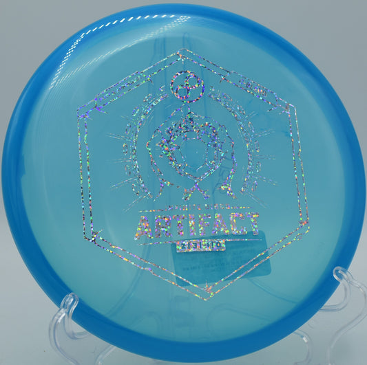 Infinite Artifact in C-Blend plastic carving a soft turnover at Idlewild Disc Golf Course in Burlington, Kentucky, ideal for finesse putts and low-speed drives.

