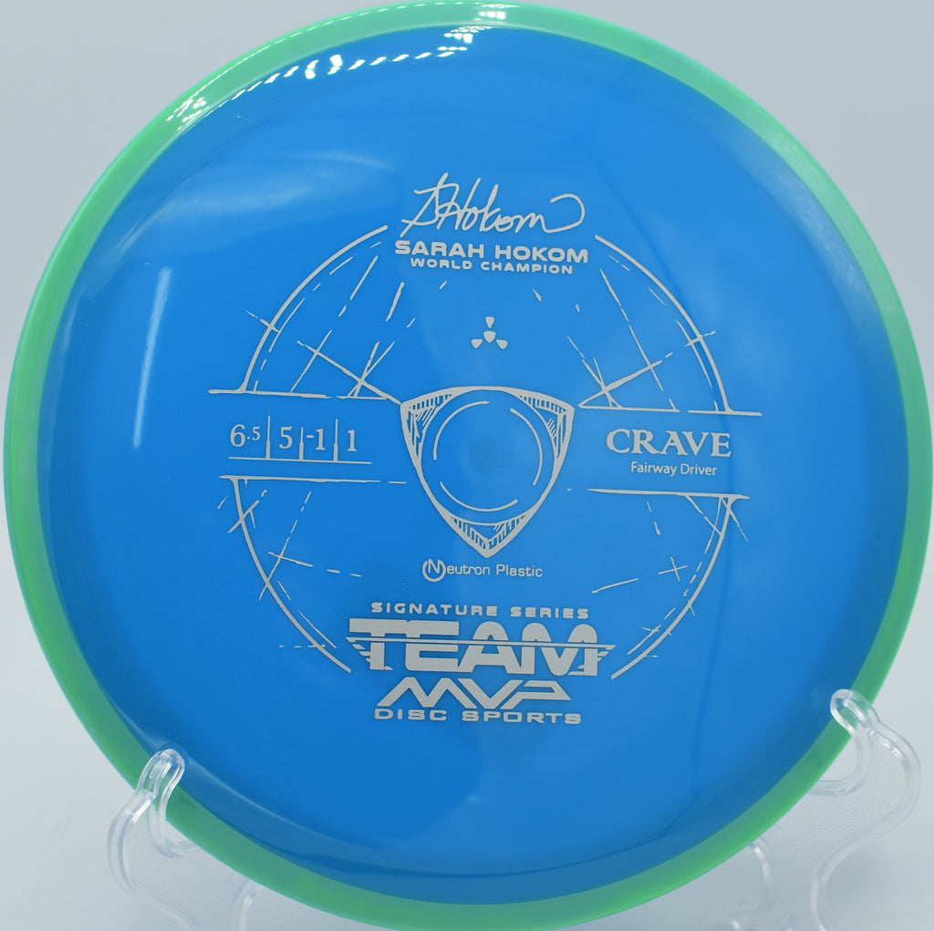 Controlled Neutron Crave shot gliding down a tight fairway at Kincaid Park Disc Golf Course in Anchorage, Alaska.

