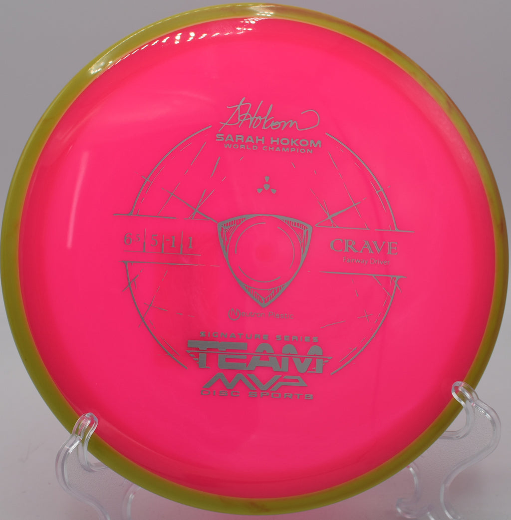 Disc golfer throwing a laser-straight Neutron Crave at Walnut Creek Park in Charlottesville, Virginia.

