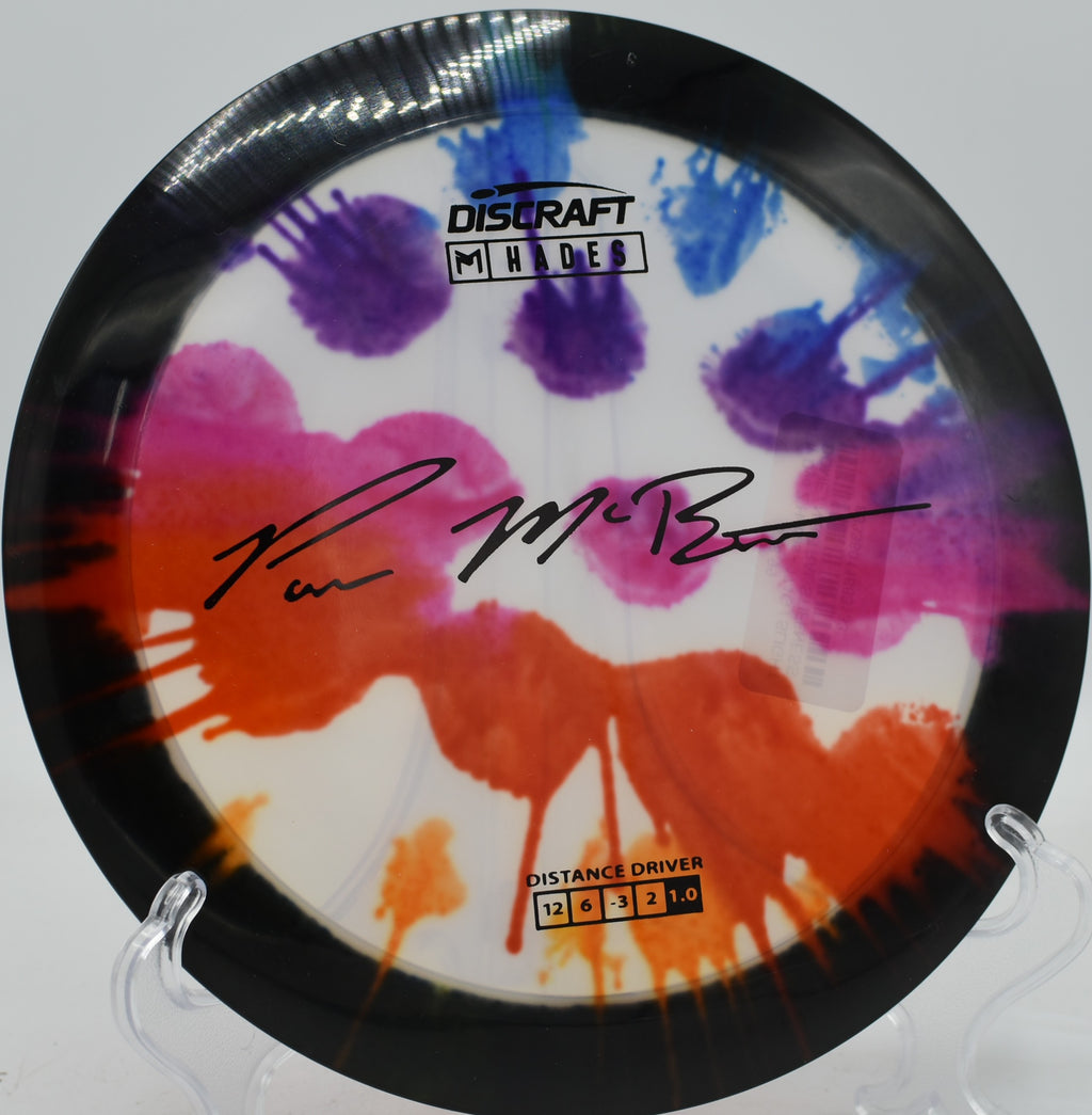 Hades in FlyDye plastic sailing on a low, flat release and gliding forever at Blue Ribbon Pines in Minnesota.

