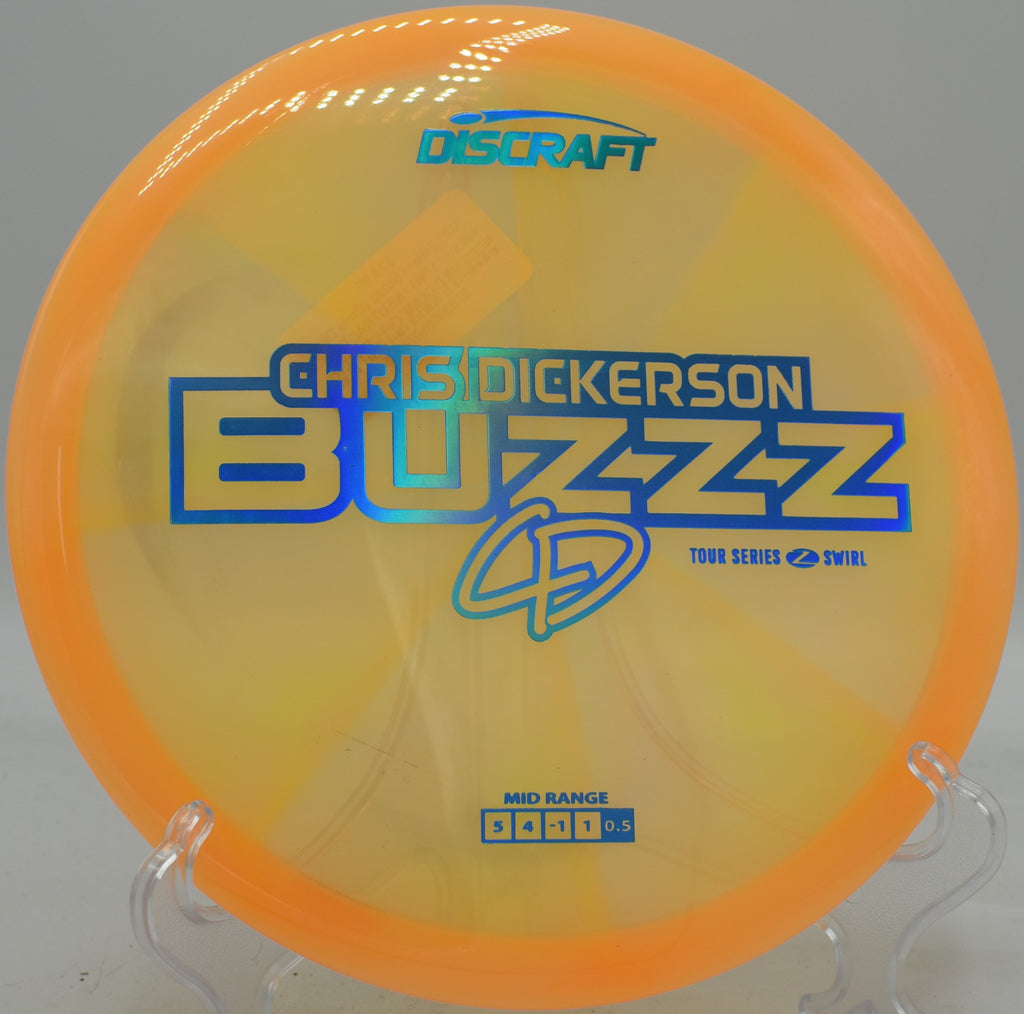 Discraft Z Swirl Buzzz launched on a clean backhand, holding a laser-straight line into Circle 1 at Harmony Bends in Missouri.








