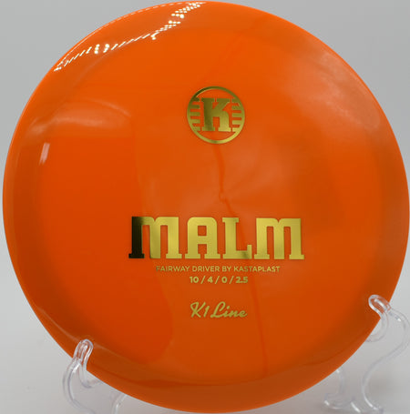 K1 Malm dancing toward the chains at Lake Marshall's Lions Course in Montross, Virginia, after a clean backhand release.

