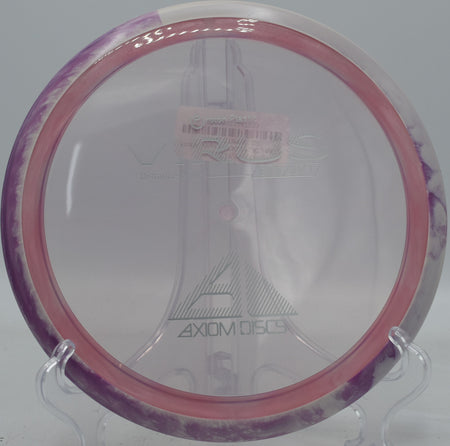 Proton Virus thrown for a smooth hyzer-flip, standing up and tracking right through the trees at Northwood Black.

