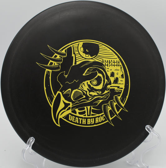 Innova DX Roc fading gently toward the basket on Hole 11 at Branson Trails Disc Golf Course, Branson, Missouri.
