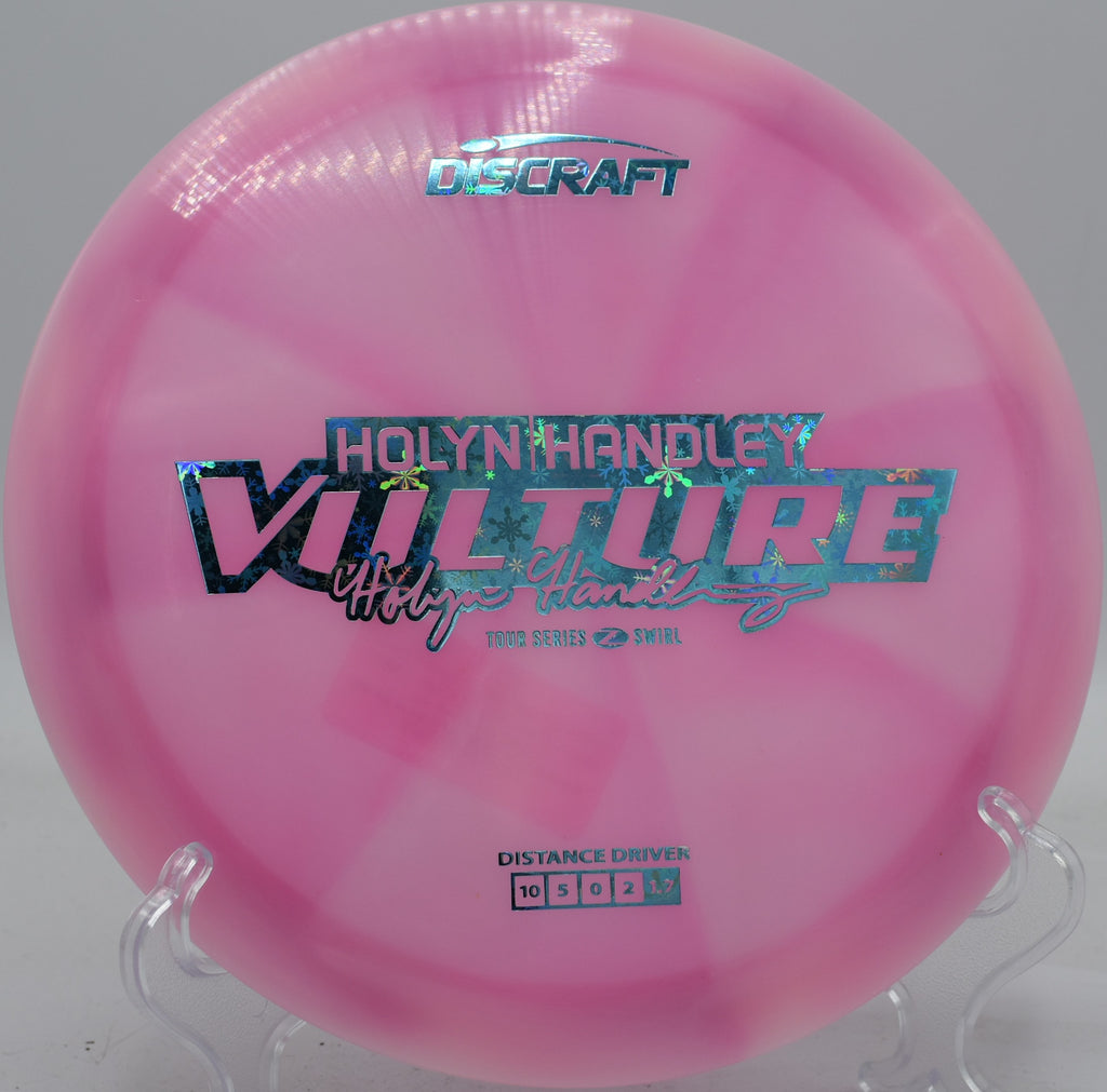 Discraft Z Swirl Vulture launched on a flat backhand, gliding straight with a late fade at Maple Hill’s long par 4.

