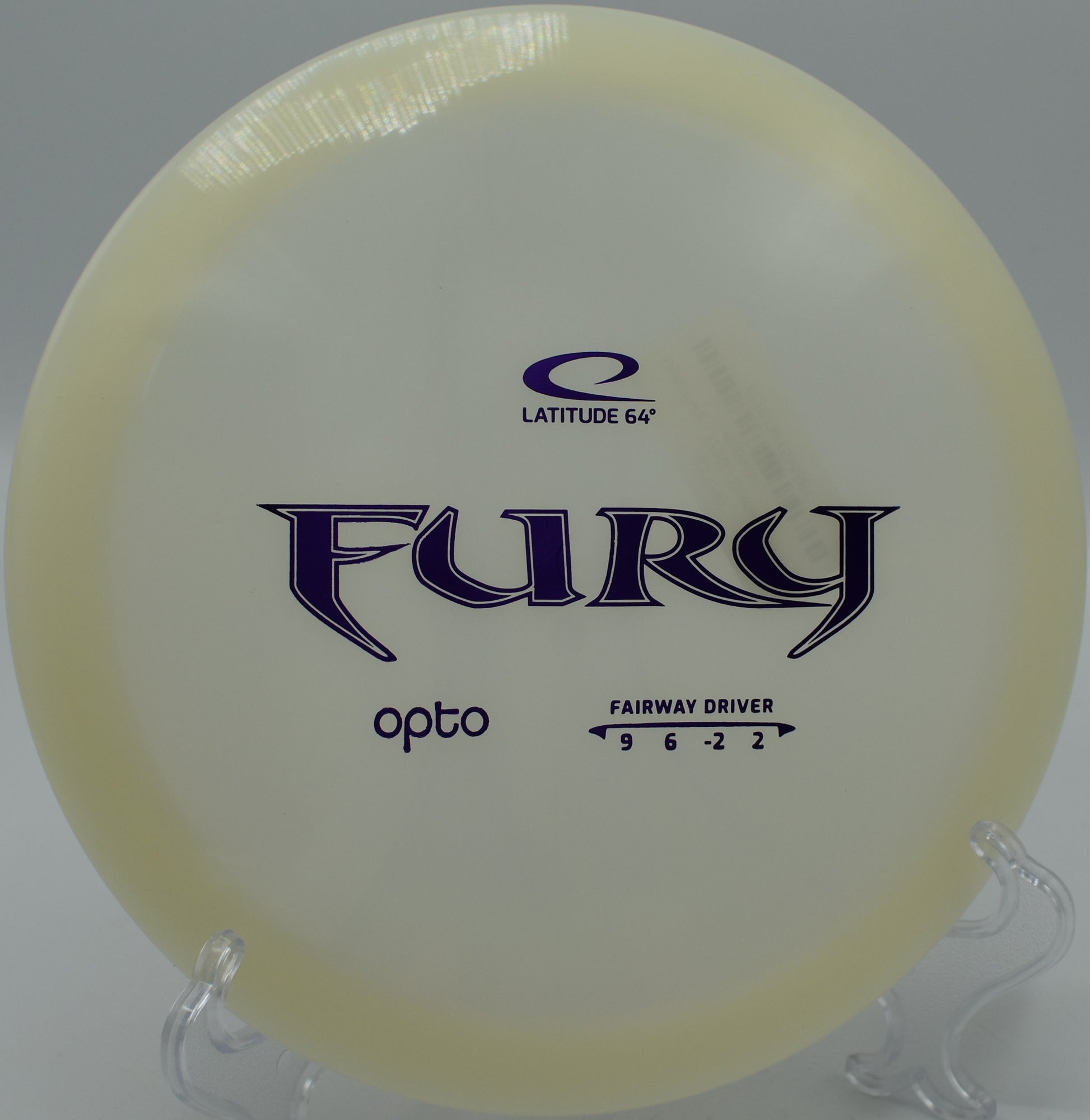 Close-up of Latitude 64 Opto Fury on a grassy fairway at Timber Creek Disc Golf Course, Olathe, Kansas.
